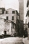 Via Battisti, già Pozzo dipinto, con il ponte delle Beccarie. La torre del Bo' è ancora intera (Fabio Fusar)
